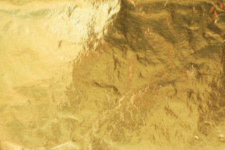 Golden foil, abstract background textureの写真素材