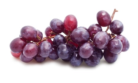 Branch of grapes isolated on white backgroundの写真素材