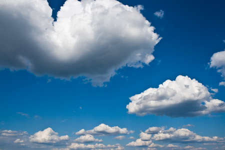 White clouds in blue summer sky background
