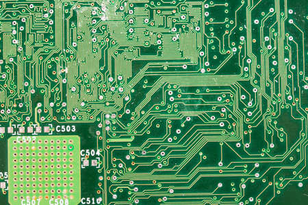 Close-up photo of electronic circuit board with integrated microchips