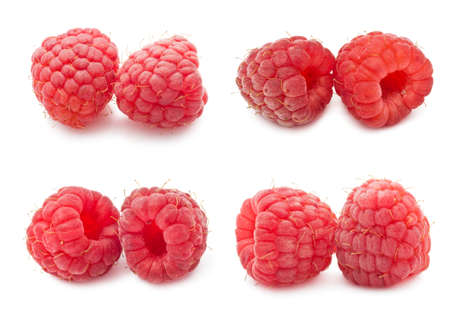 Collection of ripe red raspberries isolated on white background