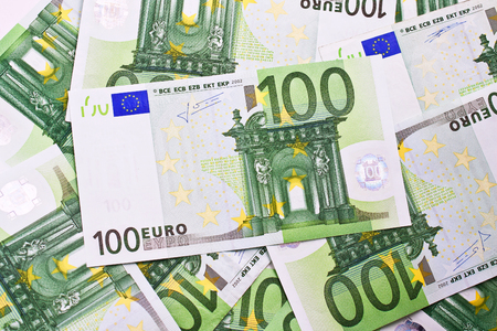 Many euro banknotes making european currency backgroundの写真素材