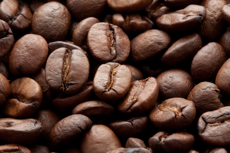 Close-up of brown coffee beans, background textureの写真素材