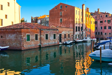View of beautiful colorful Venetian canal, Venice, Italyの写真素材