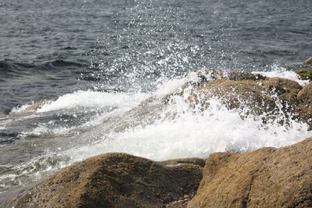waves crashing against rocks