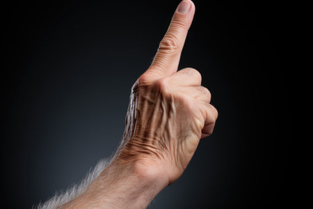 Man Hand and open one finger isolated on dark background Generative AIの素材