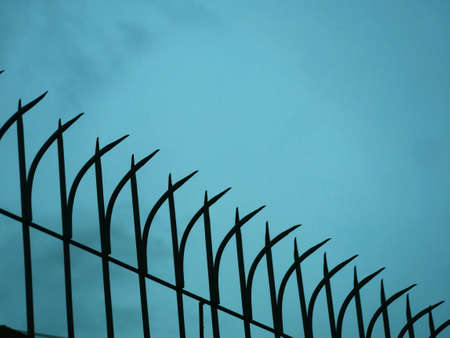 The tight prison fence is well maintained.の写真素材