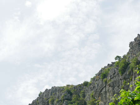 High cliffs overlooking the sky are beautiful.の写真素材