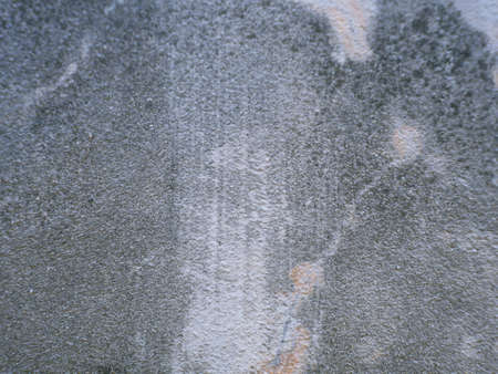 Old cement or concrete outdoor wall with stains and moldy for background.