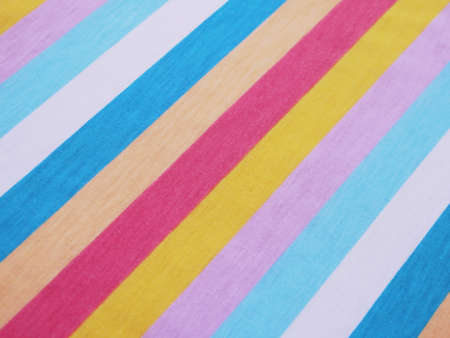 Abstract rainbow background consisting of colored trianglesの写真素材