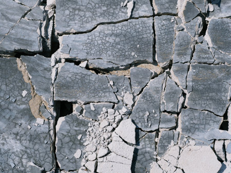 The ground was cracked because of being hit.の写真素材