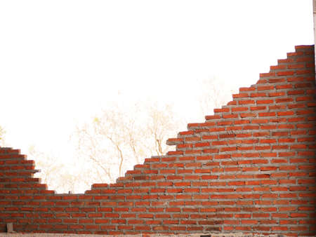 A brick wall being built.