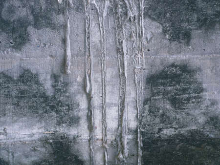 colored cement cracked concrete surface, texture of roughの写真素材