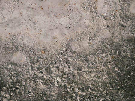 colored cement cracked concrete surface, texture of roughの写真素材