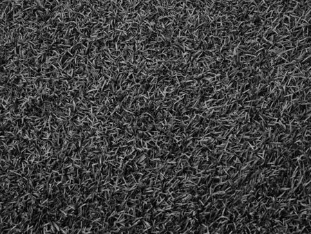 Black and white background image, rough surface, looks like a cement floor.の写真素材