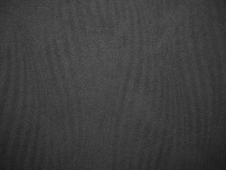 Black and white background image, rough surface, looks like a cement floor.の写真素材