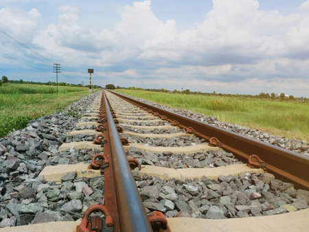 An old railroad, the route of travel when the sun goes down and sees nature and the sky.の写真素材