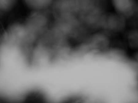Black and white background, rough texture, looks like a cement floor for background or advertising text.の写真素材