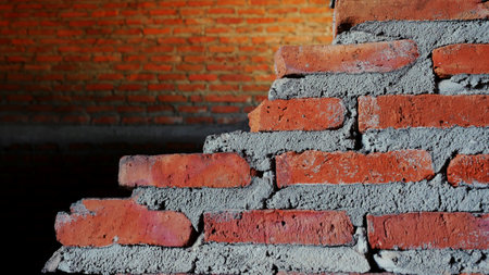 Unconventional building site The masonry was neglected, irresponsible, not progressing, only half finished. Some parts, the walls had rough surfaces.の写真素材