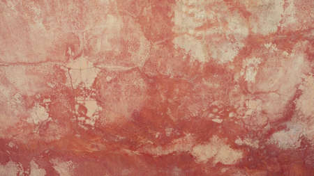 The old cement wall was weathered, the surface was scratched, the surface was scratched and damaged. For a mysterious retro-conservative background.の写真素材