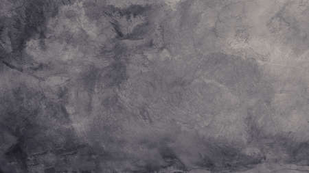 The old cement wall was weathered, the surface was scratched, the surface was scratched and damaged. For a mysterious retro-conservative background.の写真素材