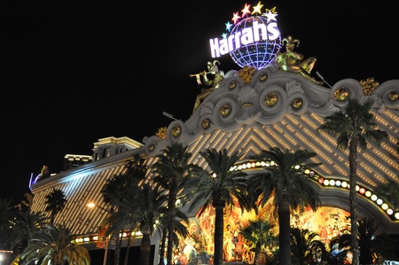 LAS VEGAS - DECEMBER 2: Harrah's Hotel and Casino sign on December 2, 2012 on the famous Strip in Las Vegas, Nevada. The hotel has 2,677 rooms and opened in 1973 as the Holiday Casino.のeditorial素材