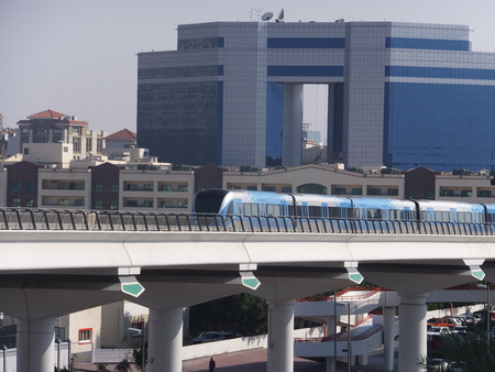 Train approaching Oud Metha Metro Station in Dubai, UAE