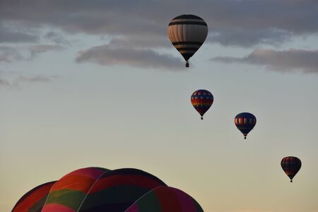 Balloon launch at dawn at the 2016 Adirondack Hot Air Balloon Festivalのeditorial素材