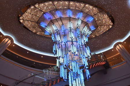LONG BEACH, CALIFORNIA - OCT 20: Crystal chandelier on the Norwegian Bliss cruise ship, docked in Long Beach, California, on Oct 20, 2018. The ship entered service on April 21, 2018.のeditorial素材