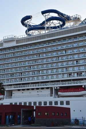ENSENADA, MEXICO - OCT 25: Norwegian Bliss cruise ship, docked in Ensenada, Mexico, as seen on Oct 25, 2018. It entered service on April 21, 2018 and is the first cruise ship to incorporate a multi-level racing track as part of its design.のeditorial素材
