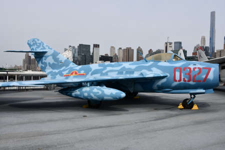 Mikoyan-Gurevich MiG-17 Fighter at the Intrepid Sea, Air and Space Museum in New York Cityのeditorial素材