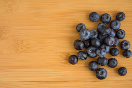 Fresh blueberries on wooden background closeupの写真素材