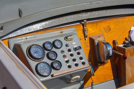 Helm of a boat, vintage wooden navigation panel.の写真素材