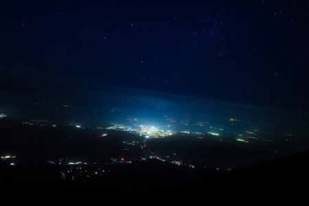 The view from the Base Camp of the city in the middle of the night star and blue sky