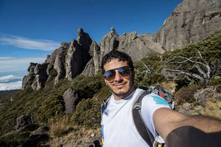 vertical shot of sunrise surrounded by rocks and paramo vegetation in Chirripo National Park