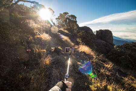 vertical shot of sunrise surrounded by rocks and paramo vegetation in Chirripo National Park