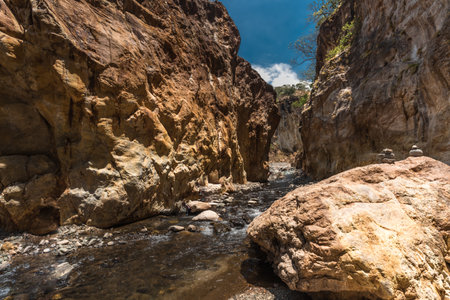 landscape of a rocky canyon and the riverbed on a hot sunny day in the province of Puntarenas in...