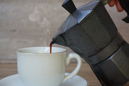 Hot coffee  on wooden background.の写真素材