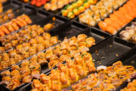 BBQ Grilled squid with meatballs at the city street marketの写真素材