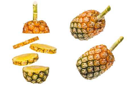 Pineapple is sliced into stack layers on white background.の写真素材