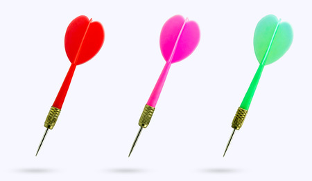 Closeup set of multicolor sharp darts on white background. Ideal for use in articles aimed at...