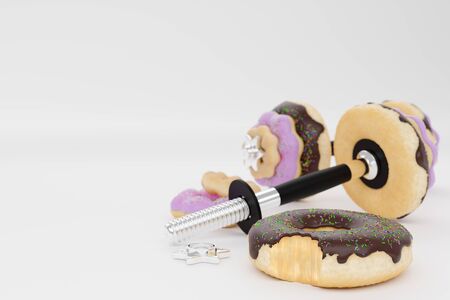 Dumbbell or barbell in the shape of donut on white background. Strawberry and chocolate flavours and have sprinkles on top of doughnut. Concept of diet and fitness for lose weight. 3D illustration.の写真素材