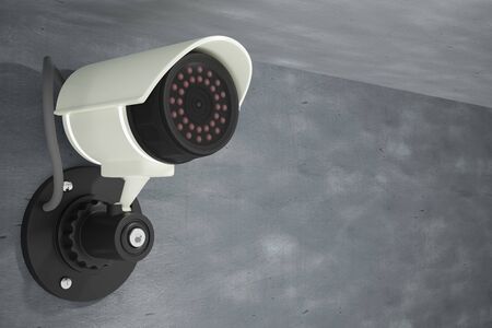 CCTV installed on a cement wall. It is a security system using surveillance of specialized video...