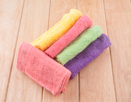 Towel placed on a wooden table の写真素材