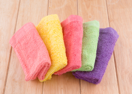 Towel placed on a wooden table の写真素材