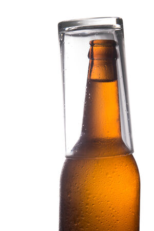 Glass beer bottles isolated on white の写真素材