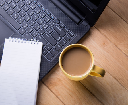 Coffee cup and notebook computers 