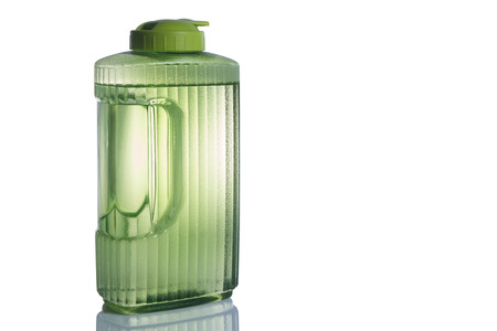 Plastic green bottle isolated on white background の写真素材