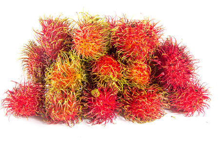 Rambutan fruits isolated on white の写真素材