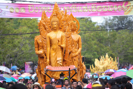 UBONRATCHATHANI, THAILAND - JULY 12  Thai tourists and foreigners are appreciated candle procession in Candle festival  Ubon Candle Festival 2014  on July 12, 2014, UbonRatchathani, Thailandのeditorial素材